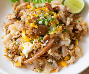 stir fried fresh rice fat noodles with chicken and egg