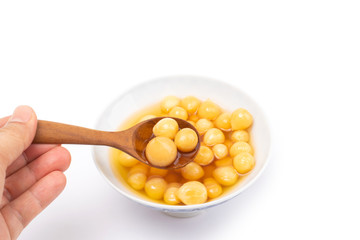 Single Bulb form of Elephant Garlic  pickle in vinegar and salt in bowl, isolated on white background.