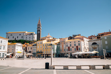 Fototapeta premium Old town Tartini square and St. George's Parish Church in Piran, Slovenia