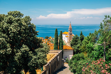 St. George's Parish Church and old town and Adriatic sea in Piran, Slovenia