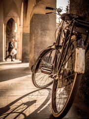 Fototapeta na wymiar Low Angle View Of Bicycle Parked In Passage On Sunny Day