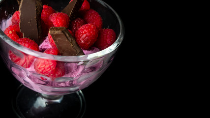 
Cup with raspberry ice cream and chocolate. Ready for entry.