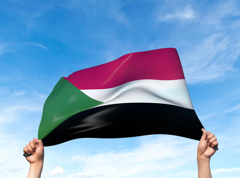 Two hands are holding a Sudan flag - flowing through the wind. 3D Illustration. - Powered by Adobe