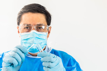 Doctor with nasal swab and test tube for coronavirus examination