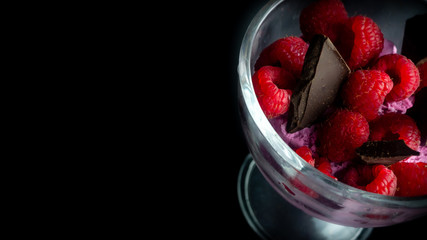 
Cup with raspberry ice cream and chocolate. Ready for entry.