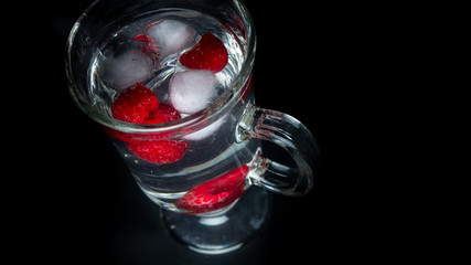 
Raspberry with ice in a water glass. Ready for entry.