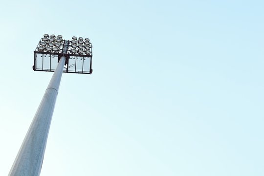 Low Angle View Of Floodlight At Stadium Against Clear Sky