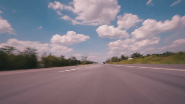 Time-lapse of driving fast speed a car on countryside road Thailand in the day time, POV shot 4k