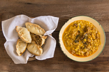 locro dishes and empanadas, traditional Argentine foods that are frequently consumed for national...