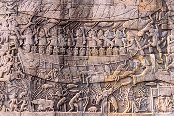 Stone carvings on the walls of the Bayon Temple in Angkor Thom
