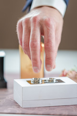 hand with a wedding rings