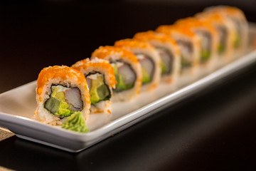 sushi and caviar on top