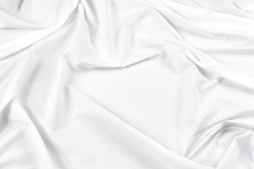 Obraz premium Abstract white fabric texture background. Cloth soft wave. Creases of satin, silk, and cotton. 