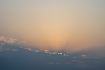 Sun Rising over the clouds