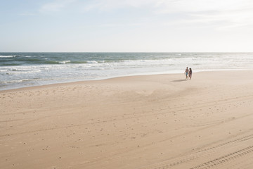 Beach with tracks of people and trucks, at sunset; in Cabo Polonio, Uruguay