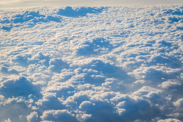 Sky and clouds from above the ground viewed from an airplane
