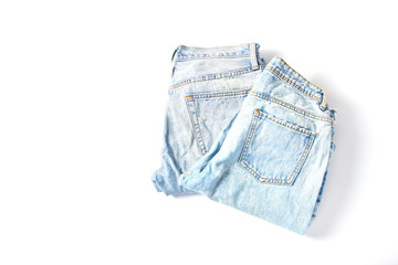 online shopping concept. a set of two pairs of jeans trousers on a white background. space for...