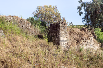 The ruins  of the fortress wall of the Ateret fortress - Metzad Ateret - Qasr Atara - located next to the Gesher Benot Ya'akov bridge on the Jordan River, in northern Israel
