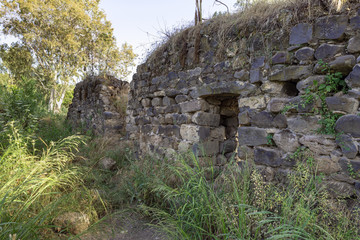 The ruins  of the fortress wall of the Ateret fortress - Metzad Ateret - Qasr Atara - located next to the Gesher Benot Ya'akov bridge on the Jordan River, in northern Israel
