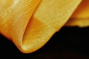 beautiful yellow texture of cloth in abstract macro for background