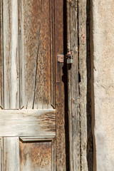 Weather-beaten door on store room on Karoo farm South Africa