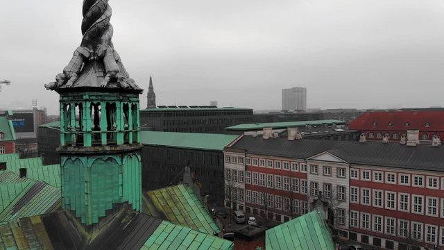 Orbit around tower of dragons of The Old Stock Exchange (B&oslash;rsen), Copenhagen, Denmark-4K