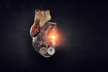 Image of human heart made of metal elements