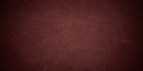 
Red abstract background. Toned fiberboard texture. Close-up. Burgundy vintage background. Black red grunge banner with copy space for your design