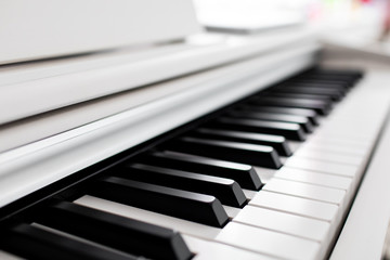 Fototapeta na wymiar White piano keyboard with copy space, Minimal music concept