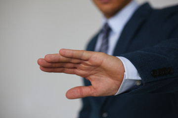 Gesture male hand rejection says no male businessman in a suit