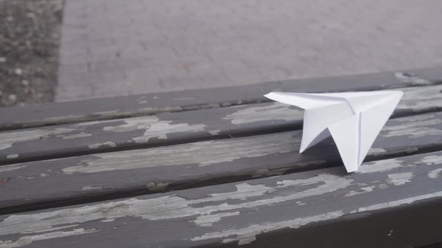 Paper Airplane Flies Onto Bench In College Campus UC San Diego