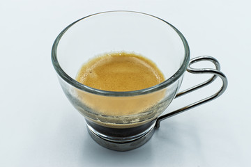 A cup of italian espresso coffee isolated on white
