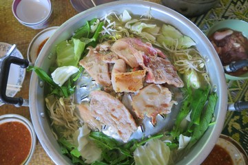 Soft focus of grilled pork on the pan in thai style. Thai Barbeque is favorite food for party. Food concept.  