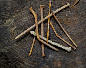 rusty nails on wood