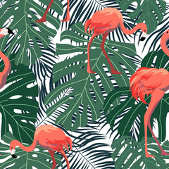 Seamless pattern with pink flamingos on background with tropical leaves. Cartoon vector illustration