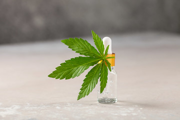 Cbd cannabis oil on light background . Medical hemp extract.