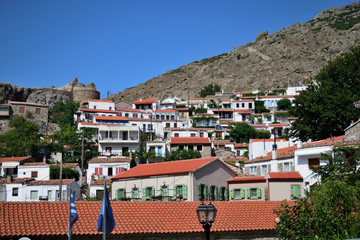 traditional houses and old castle in the Chora town - capital town of aegean Samothraki island, Greece, Aegean sea