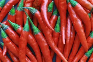 Hot red pepper. Chilean pepper on a black.