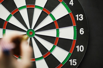 Darts. The dart for playing in the game board is stuck. Hit the sector in darts. The concept of a...