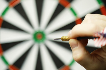 Darts. The dart for playing in the game board is stuck. Hit the sector in darts. The concept of a...
