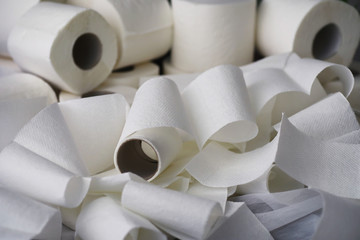 Toilet paper in a roll. Snow-white soft three-layer toilet paper. Lack of hygiene products. Primary...