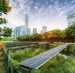 Ecological energy renewable solar panel plant with urban landscape landmarks
