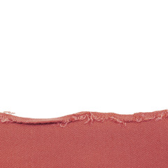 Destroyed clothing. Fabric texture, sewing material, torn cloth. Cut piece of fabric. Rag background with torn ragged edge. Frame isolated on a white background. Template, background, empty space.
