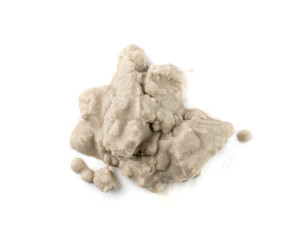 Sandy beach textured pile isolated on white background