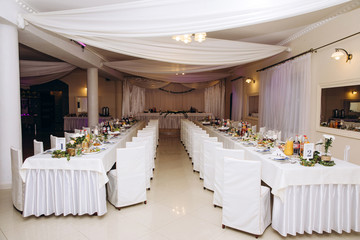 Banquet table setting and decoration. Cutlery on the table.