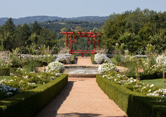 White garden in the picturesque Jardins du Manoir d Eyrignac in Dordogne. France