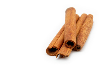 Cinnamon sticks isolated on white background.