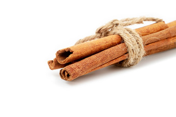 Cinnamon sticks isolated on white background.