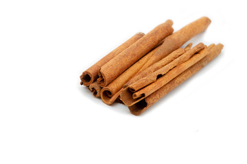 Cinnamon sticks isolated on white background.
