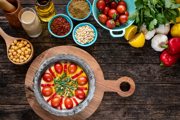 Hummus (Middle East food) on the table with top view